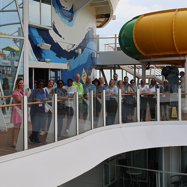 Agents standing on deck of ship