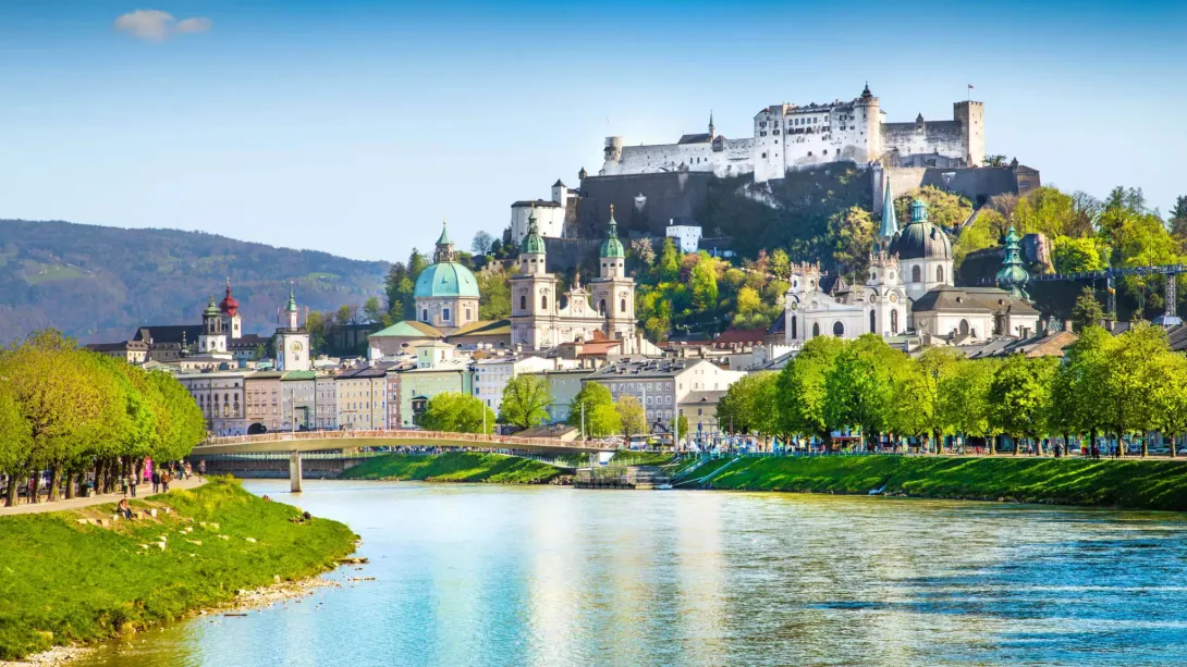 European River Cruising with a castle on a hill